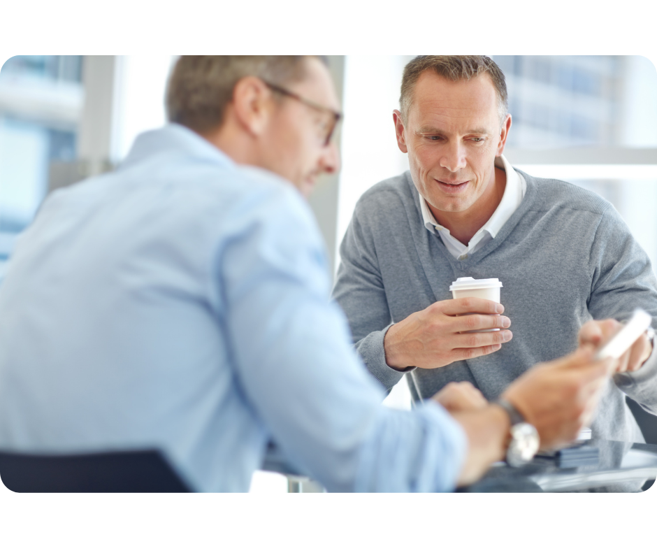 Two men professionals looking at a phone