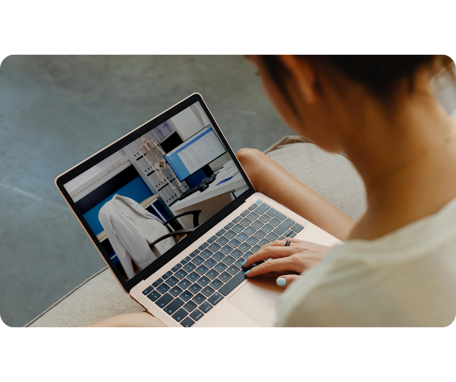 girl-looking-laptop-picture-office
